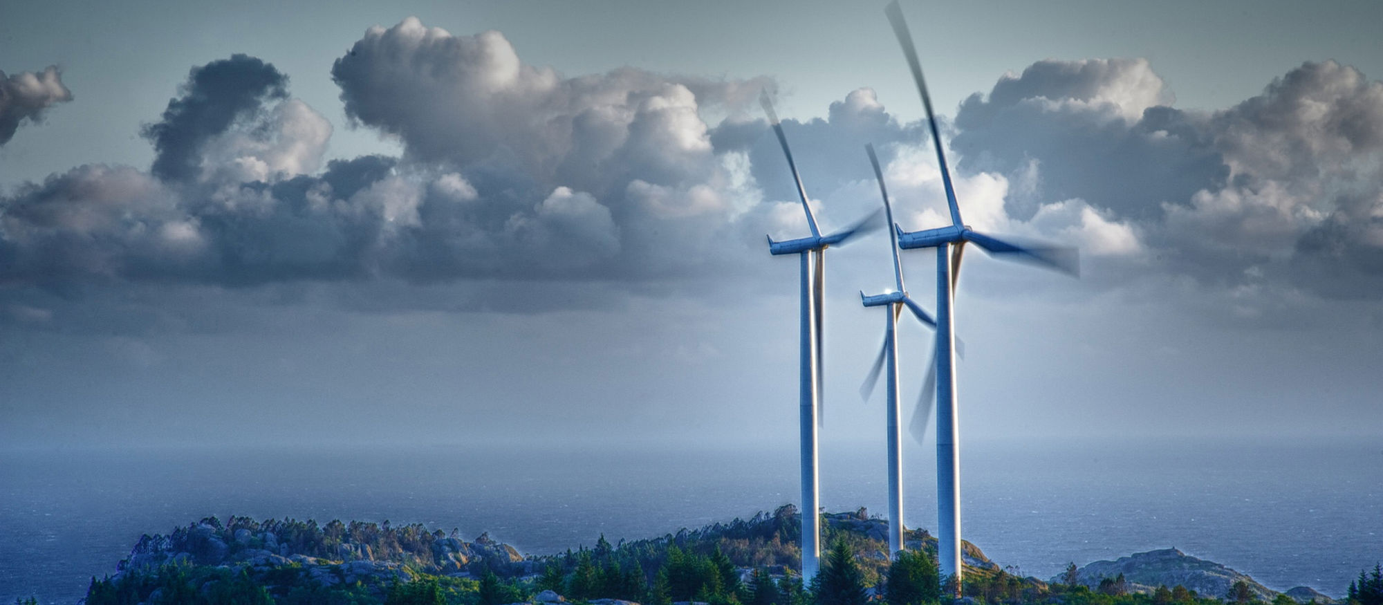 Three wind turbines. Photo.